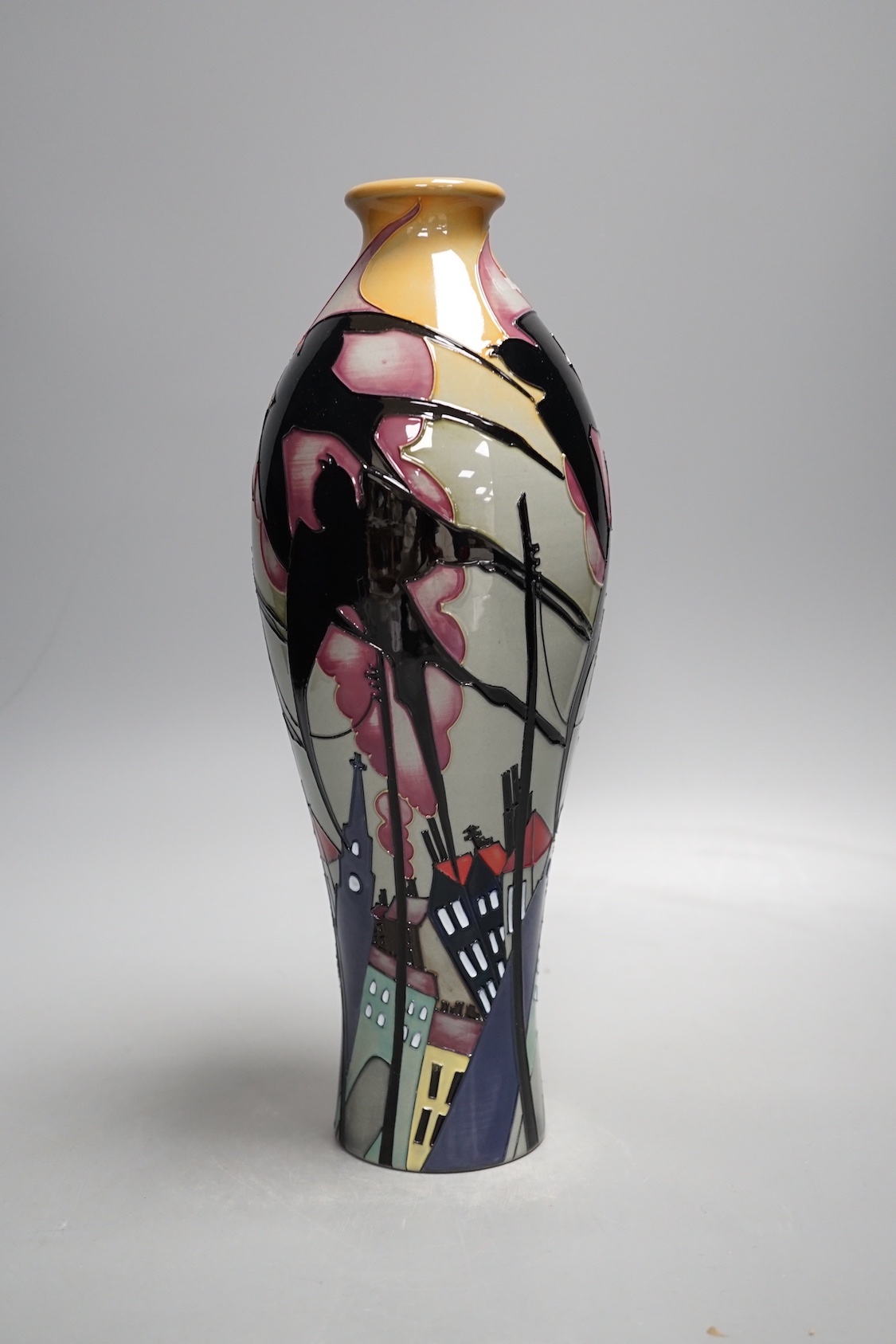 A rare Moorcroft 'swallows in smoke' vase by Kerry Goodwin, 2012, 31cms high.